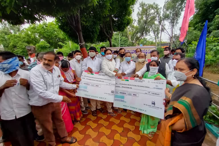 Parakala MLA Distributes Cheques In Warangal Collector Office