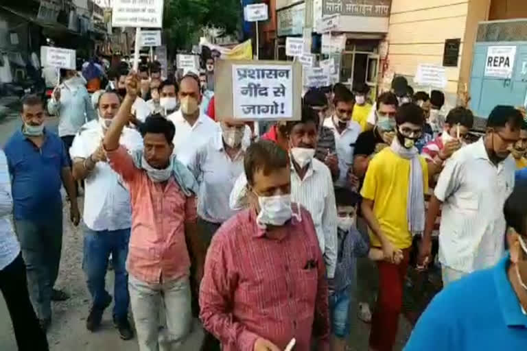 people take out candle march regarding scooty rider death in fight between two bulls rewari