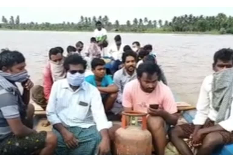 godavari flood victims transport  through boats not maintains social distance