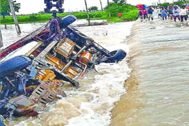 a bolero van carrying chickens overturns in near nashimpet suryapet district