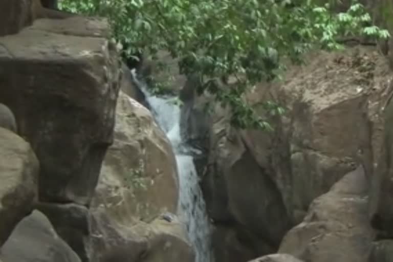 A young man falls off a hill and dies