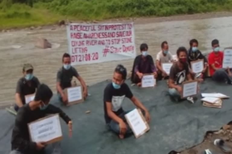 Strong protest against the demand of stopping the illegal excavation work of Diyung River