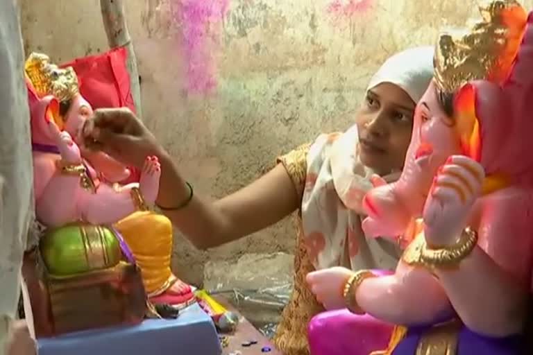 A Muslim woman making a Ganesh idol in Hubli.....