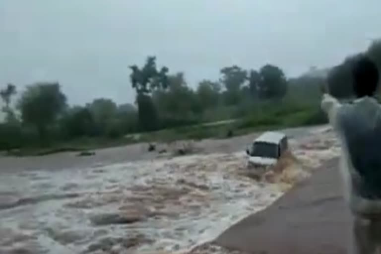 Maruti van in a booming stream