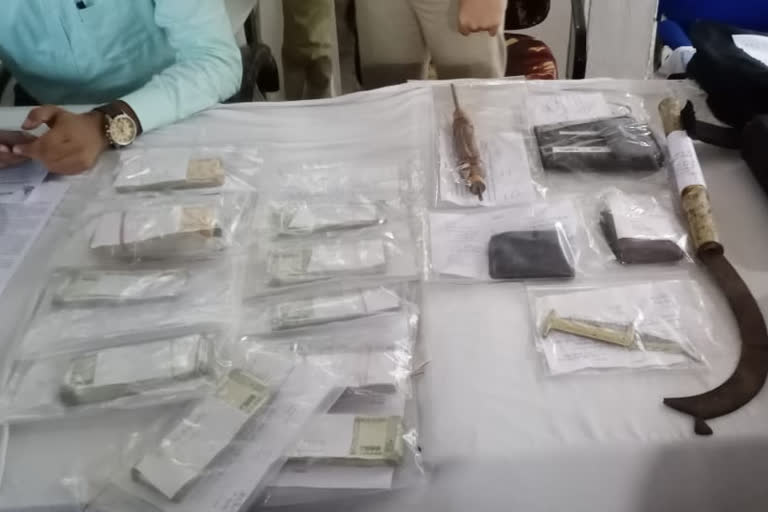 Items including cash recovered from the accused