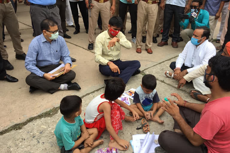 DM and CDO listened the complaint of  victim on the ground at greater noida Collectorate office