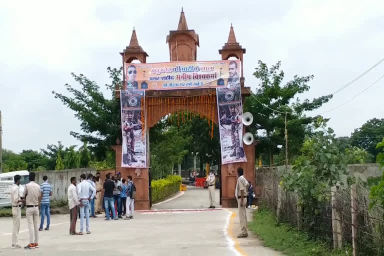 Martyr's entire village decorated with posters