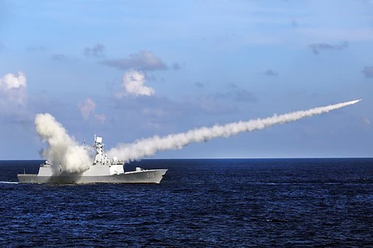 China fires 2 missiles into South China Sea to 'warn' US