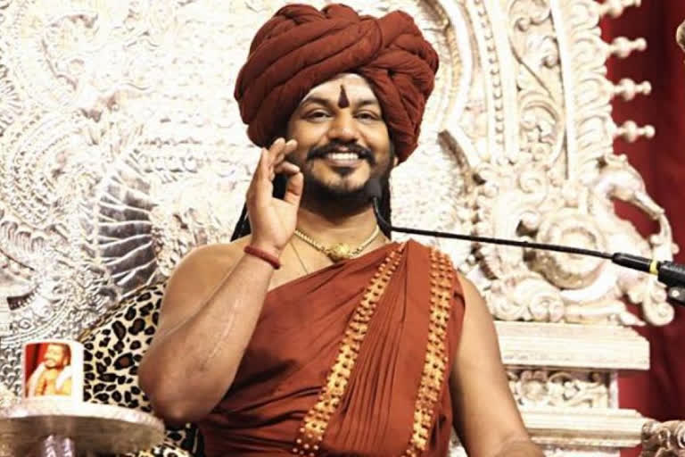 allegations-on-nithyananda-who-launched-kailasha-dollar