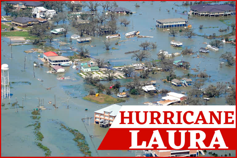 Buildings and homes are flooded in the aftermath of Hurricane Laura on Thursday in Cameron.