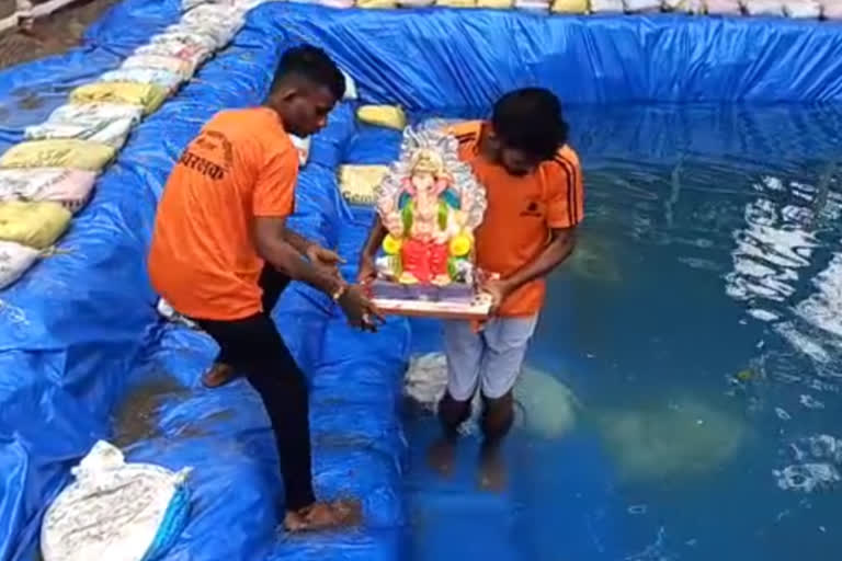 ganesh and gauri imersion in artificial lake mumbai