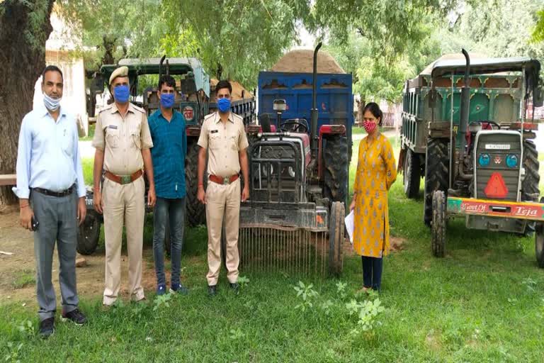 gravel filled dumper seized,  gravel filled tractor trolley seized