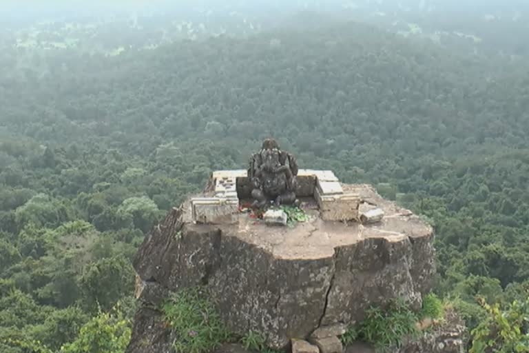 Dholkal Ganesha worshiped at the top of a hill in a nature camp