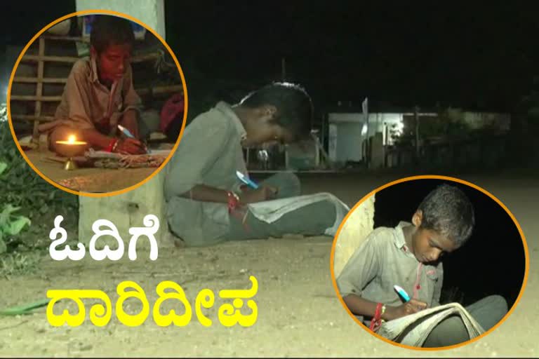 Guy reading under street lights in Gadag