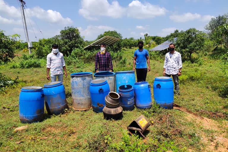 800 litres of jaggery for cheap liquor caught by police in vijayangaram district