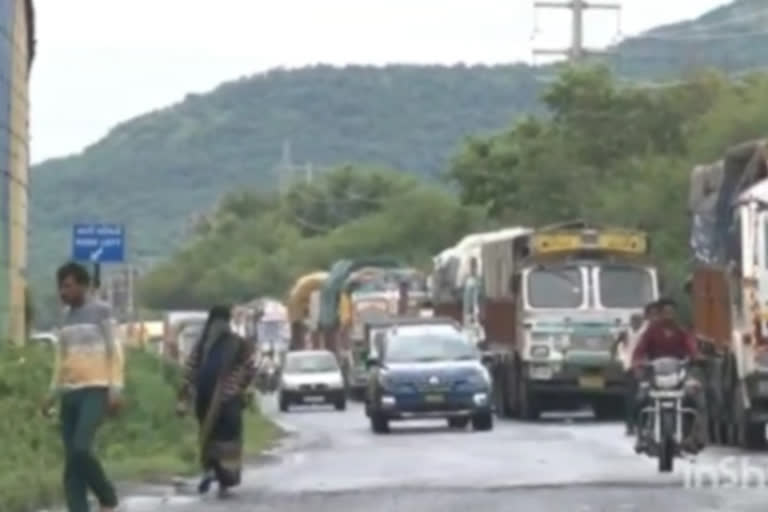 Heavy rain stops the wheels of trucks