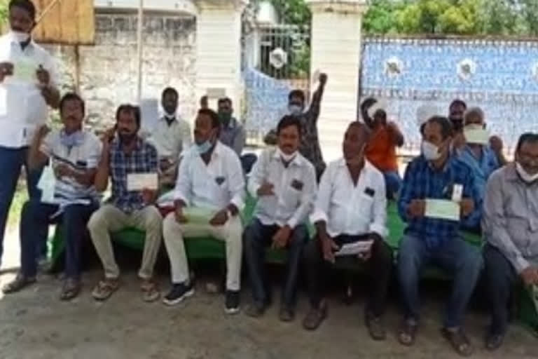 Workers protested in front of industry to pay arrears in sangareddy district