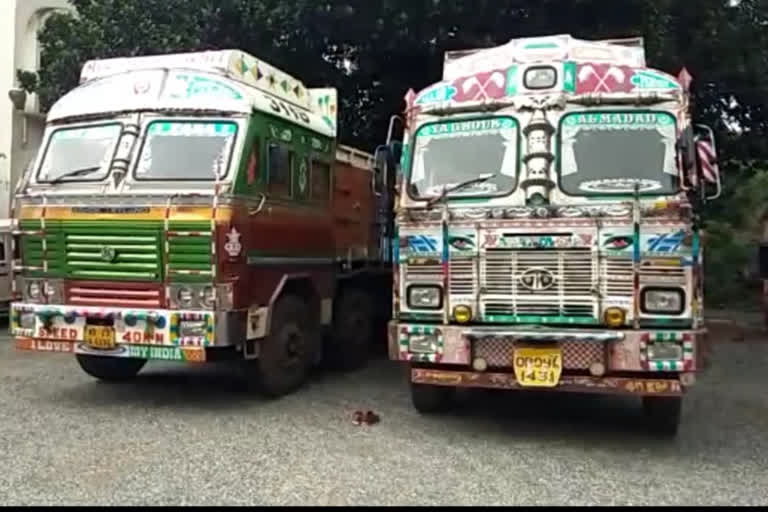 Karanjia police seized two illegal trucks