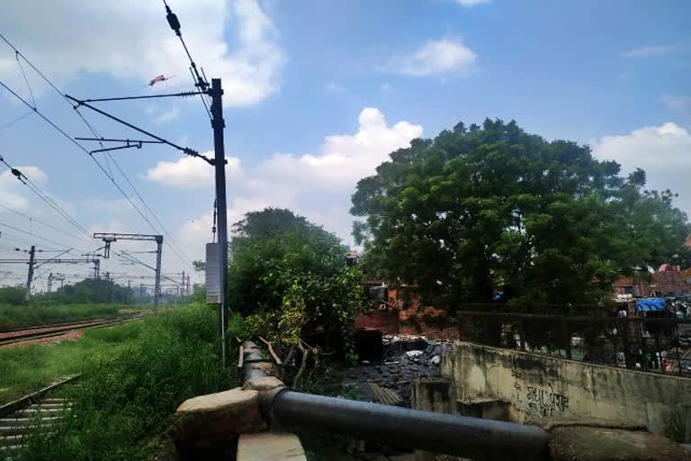 slum dwellings along rail tracks