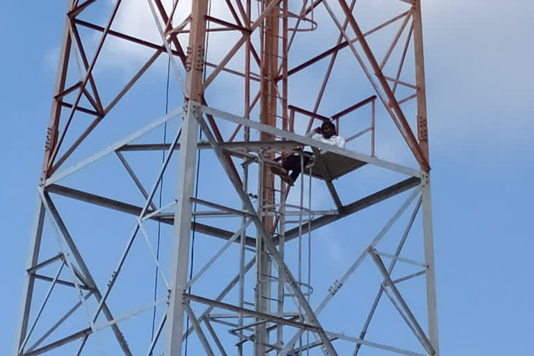 Man Halchal on Mobile tower in Medak District