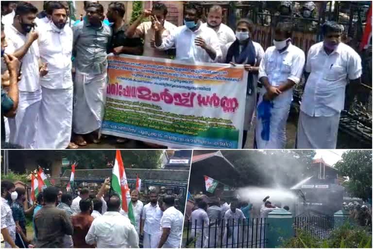 പ്രതിഷേധമാർച്ച്  പുതുക്കാട് കോണ്‍ഗ്രസ് പ്രവര്‍ത്തകർ  ജലപീരങ്കി  തൃശൂർ മാർച്ച്  സി.രവീന്ദ്രനാഥ്  പുതുക്കാട് ഓഫിസ്  പാലിയേക്കര ടോൾ പ്ലാസ  police fired water  protest in thrisur  puthukkad  c raveendranath