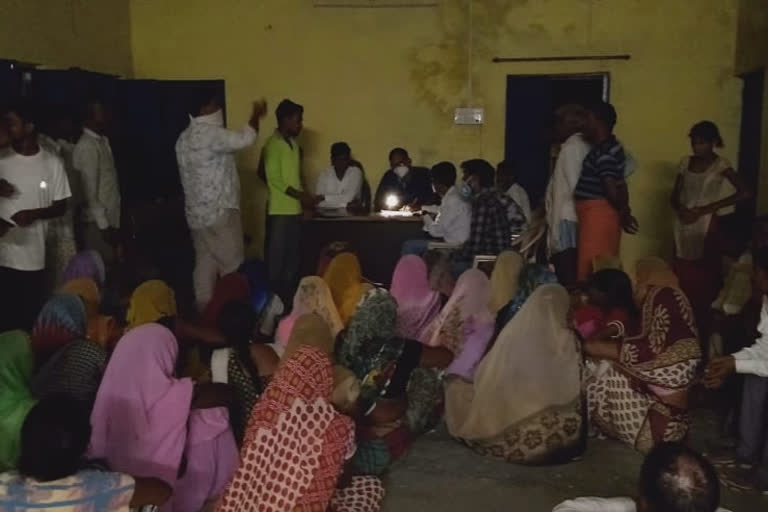 Women sitting on dharna in gram panchayat in panna