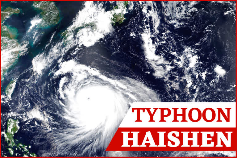 Typhoon Maysak over South Korea, hidden behind the white circle at upper left, as another tropical storm, Haishen, sweeps northward and is projected to slam Japan's southern main islands of Kyushu and Shikoku, as well as the southwestern tip of Honshu by this weekend.