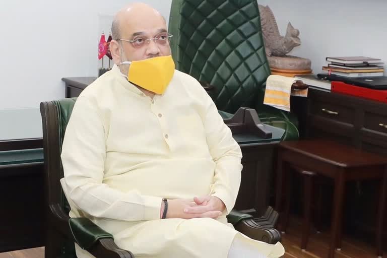 AMIT SHAH