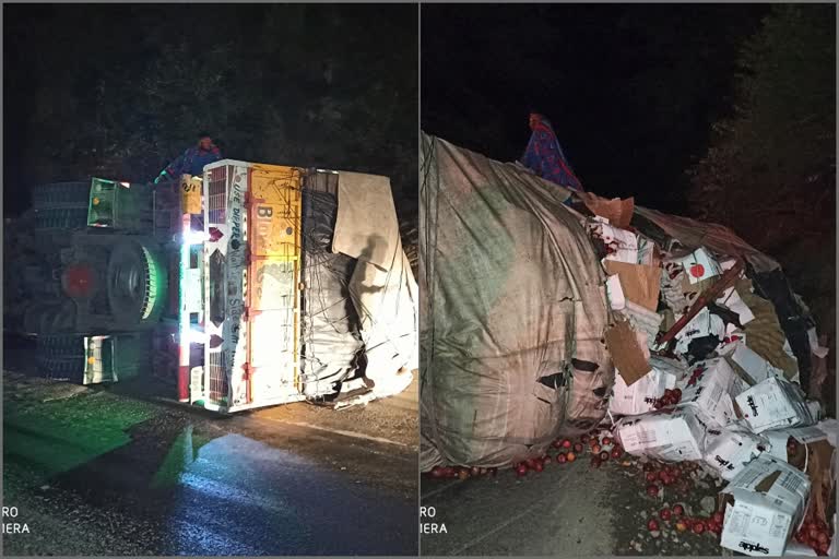 Truck full of apples overturns in Hassan Valley