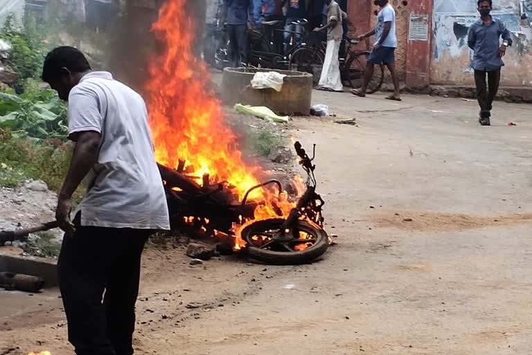 motorcycle catches fire