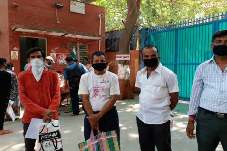 labor cards in workers registration camp