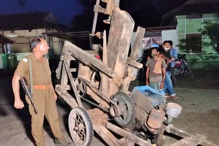 Illegal wood and machine seized at Bilasipara