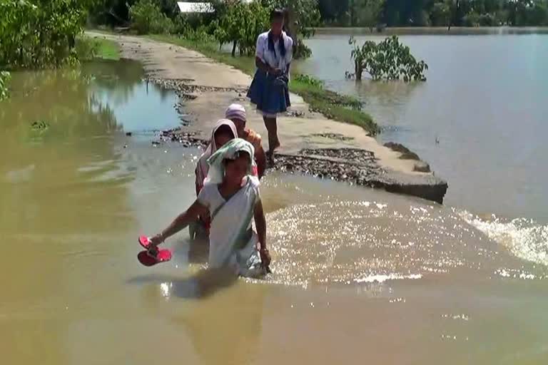 PWD Road damaged due to flood at Jonai