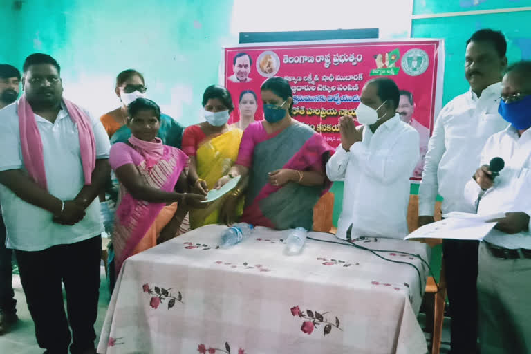 MLA Haripriya distributing Kalyana Lakshmi checks