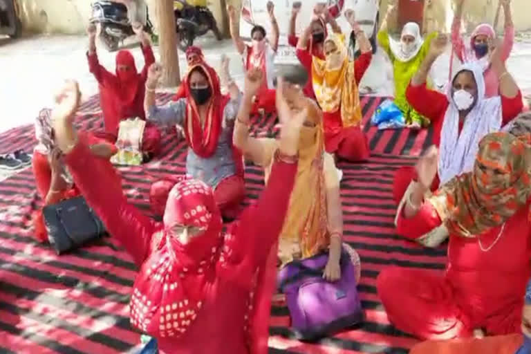 asha workers protest in jhajjar