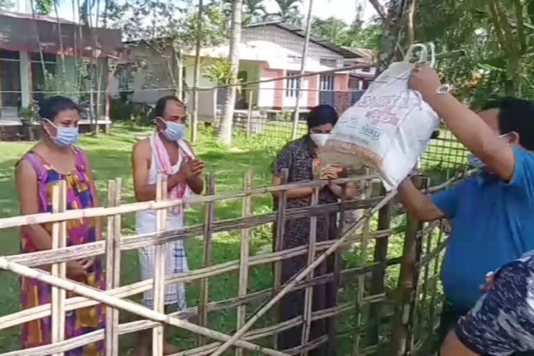 Health workers at the doorstep of dead covid-patient family at Satia