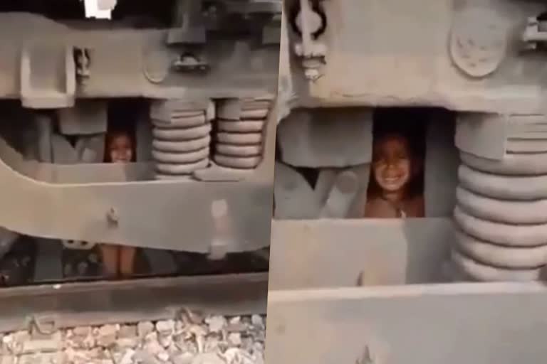 boy threw his younger brother in front of moving train