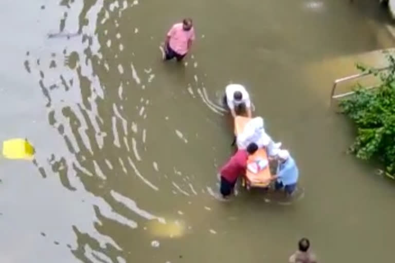 Mumbai Nair hospital doctors carried on stretcher amid water in hospital