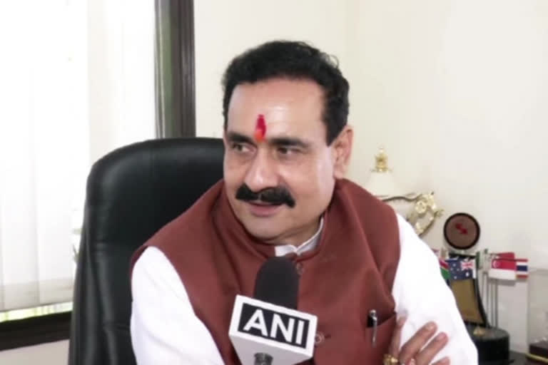 not wearing mask  Narottam Mishra  മാസ്‌ക്  പുലിവാൽ  ആഭ്യന്തരമന്ത്രി  നരോട്ടം മിശ്ര