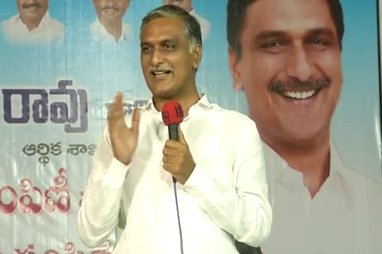 Minister Harish Rao participating in the cheques distribution program in siddipet