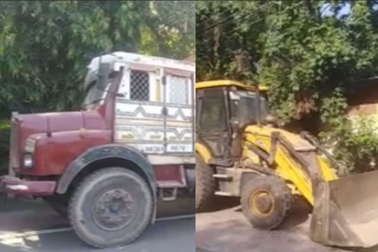 illegal jcb machine and truck seized in noida uttar pradesh