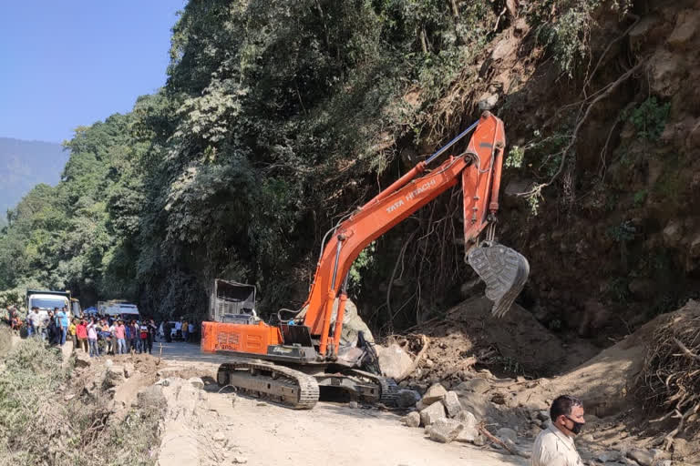 stone fall on JCB