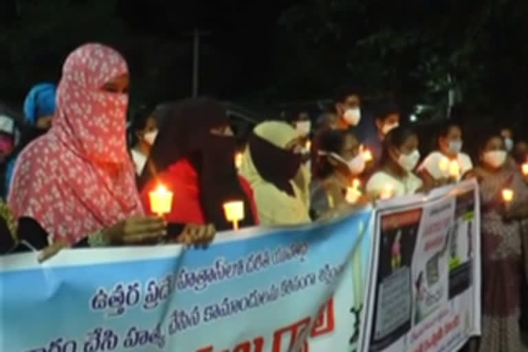 candle raly at kankinada againsat htras rape case