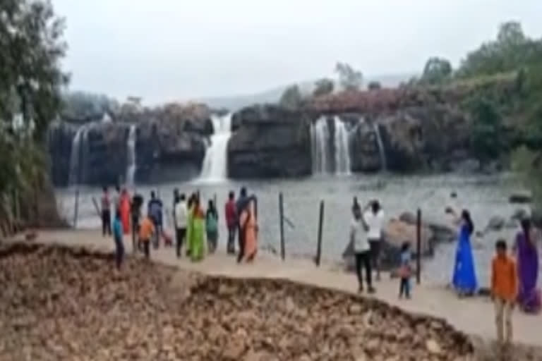 heavy crowd at bogatha waterfalls in mulugu district