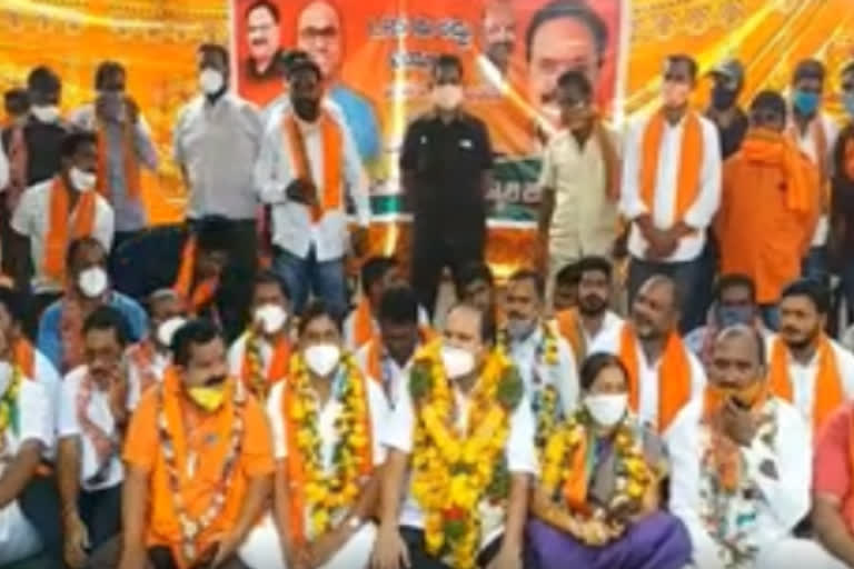 bjp leaders protest in front of jagityal collectorate against lrs policy