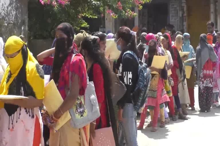 students crowd in post office