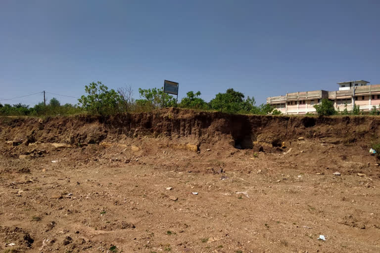 After illegal excavation around the model school, the city council built the garbage base