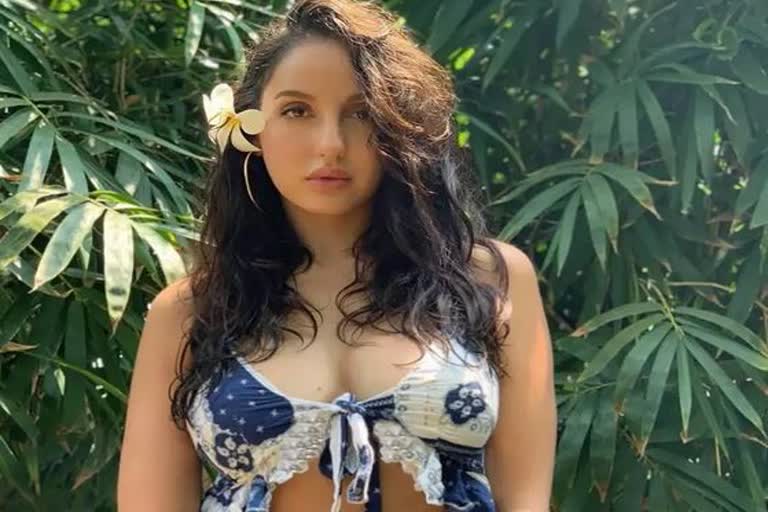 nora fatehis alluring look in her latest picture is turning up the heat on the internet