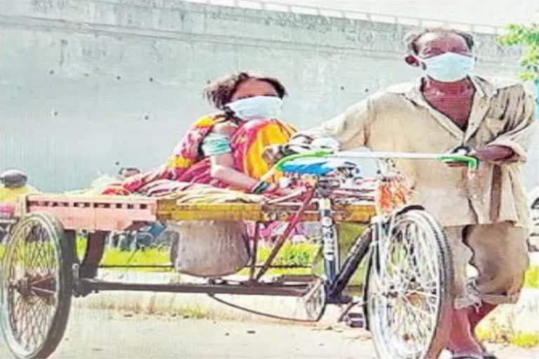 AN OLD MAN TAKEN HIS WIFE TO HOSPITAL ABOUT 80 KM  AWAY BY RICKSHAW