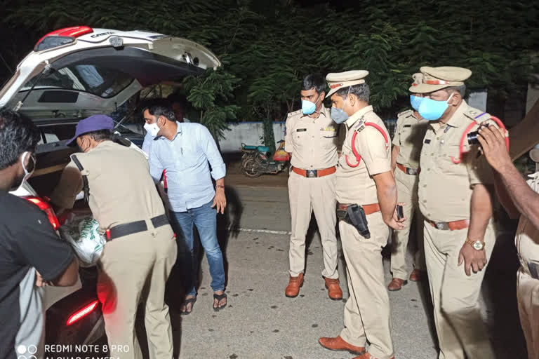 Police inspect vehicles in the wake of the by-election in siddipet district